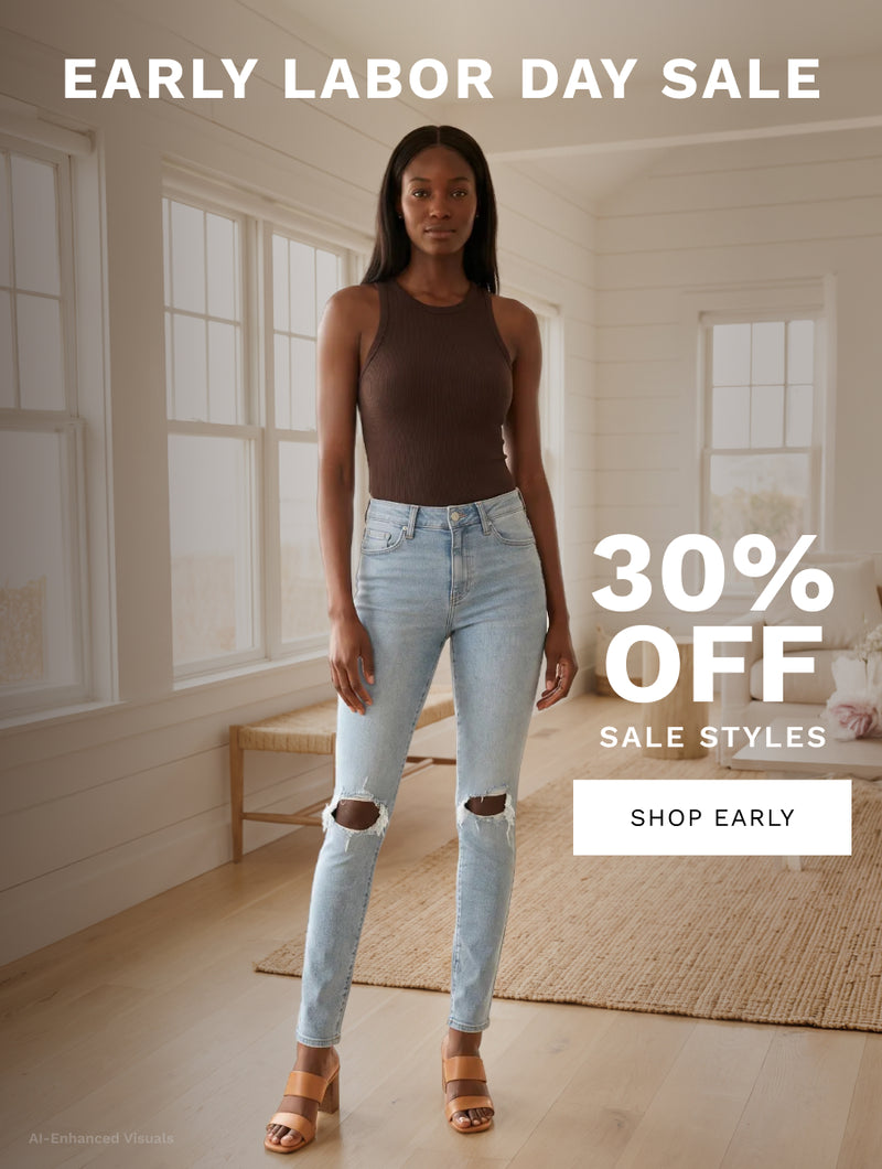 A woman stands in a bright, white-walled room wearing a sleeveless brown top and light-wash ripped jeans with brown heeled sandals. Large sale text reads 'EARLY LABOR DAY SALE', '30% OFF SALE STYLES', and 'SHOP EARLY'.