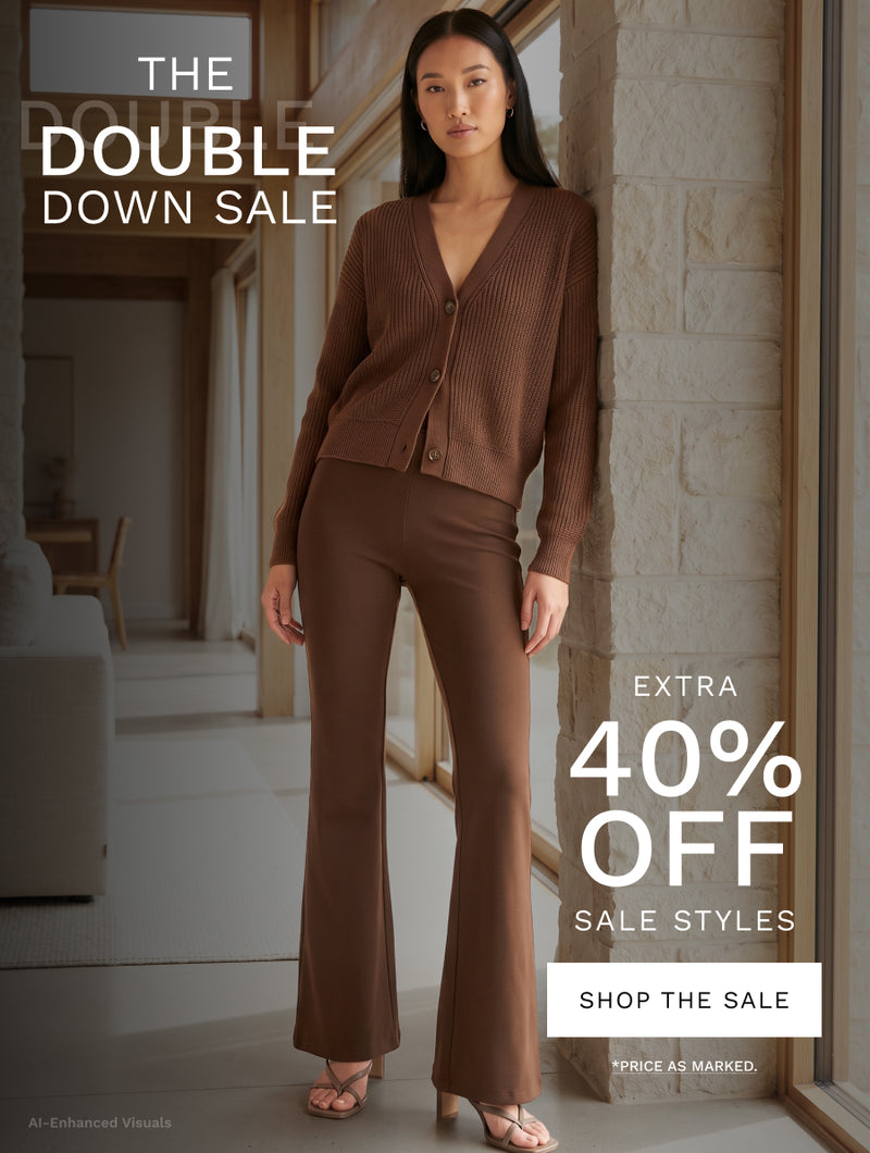 A woman models a matching brown ribbed knit cardigan and flared pants set in a modern indoor setting with stone columns. Large sale text overlays read 'THE DOUBLE DOWN SALE', 'EXTRA 40% OFF SALE STYLES', and 'SHOP THE SALE'.